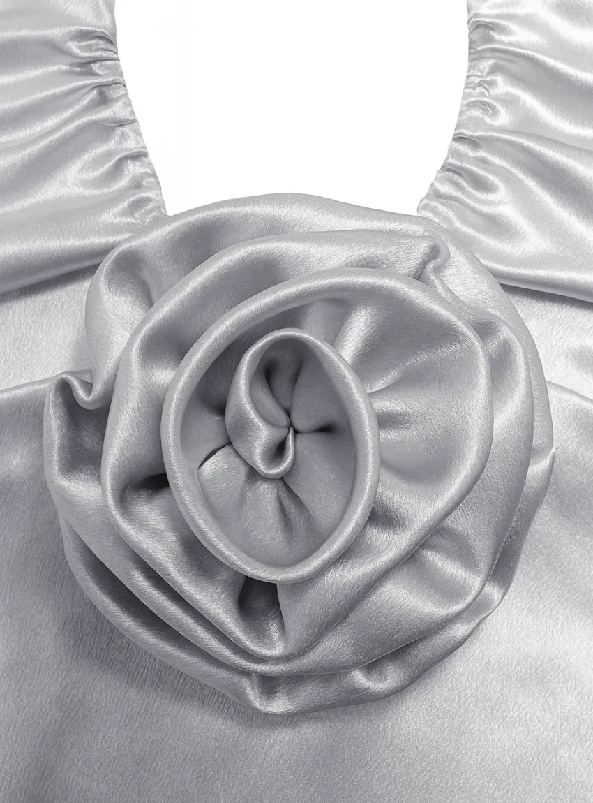 Silver satin strappy halter mini dress with ruched bust and rose appliqué. (3)