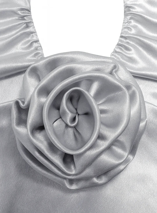 Silver satin strappy halter mini dress with ruched bust and rose appliqué. (3)